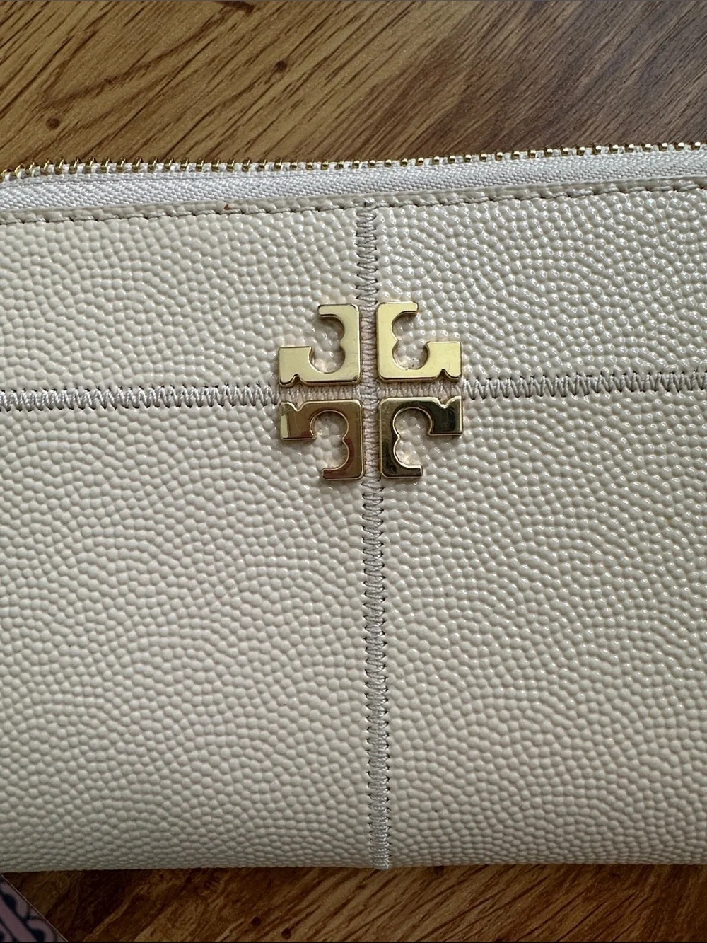 Tory Burch Pebbled Cream Zip-Around Wallet with Gold Logo